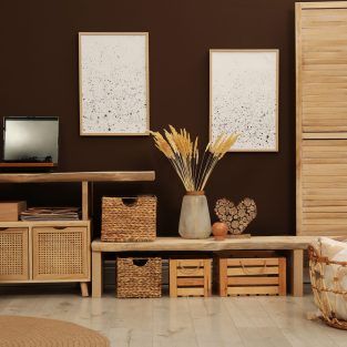 Trendy boho style furniture and decor in room. Interior design